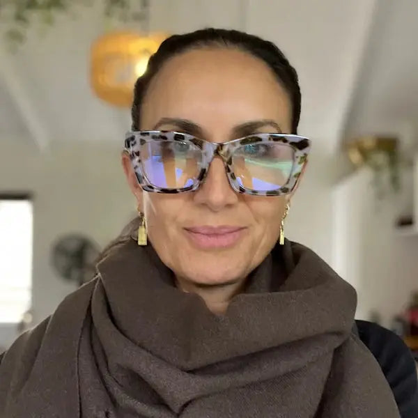 Person wearing a brown scarf and colorful sunglasses indoors. Simple Scarf Chocolate - The Rose Edit
