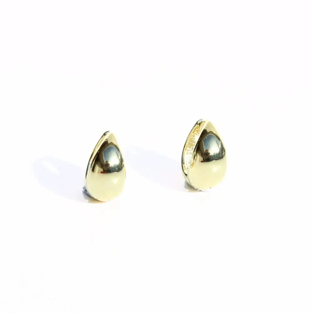 Gold teardrop-shaped earrings on a white background