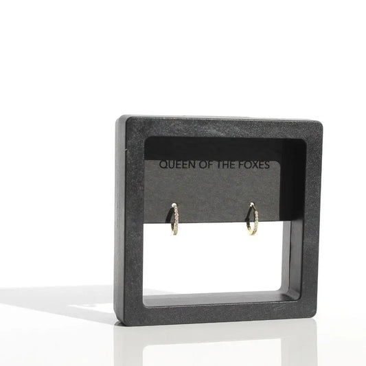 Earring display card with 'Queen of the Foxes' branding on a white background. Petite Sleepers Fine - The Rose Edit