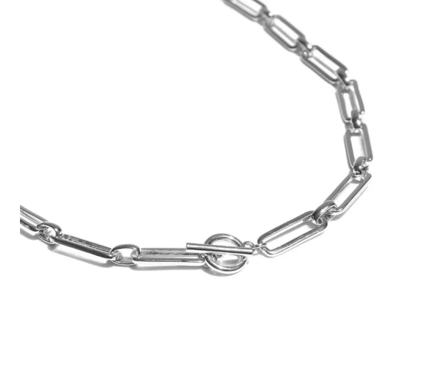 Silver chain bracelet on a white background