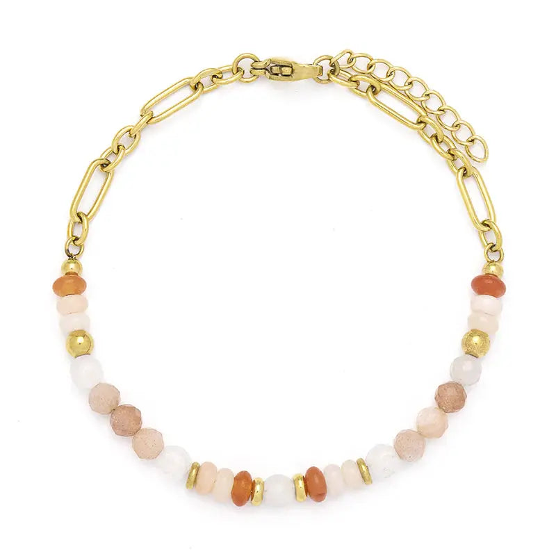Gold chain bracelet with multicolored beads on a white background
