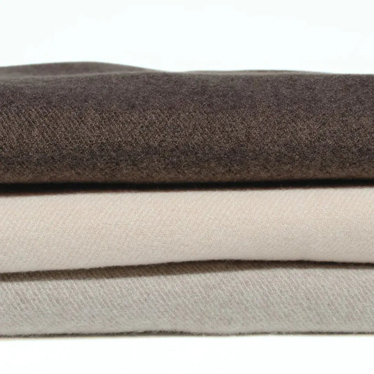 Stack of brown and beige fabric swatches on a white background. Simple Scarf Chocolate - The Rose Edit