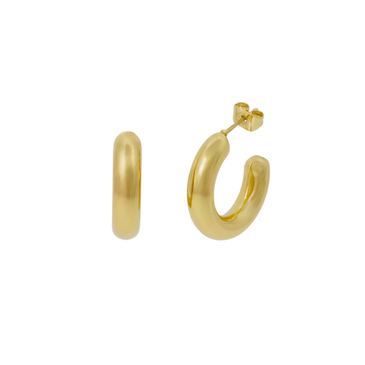 Gold hoop earrings on a white background