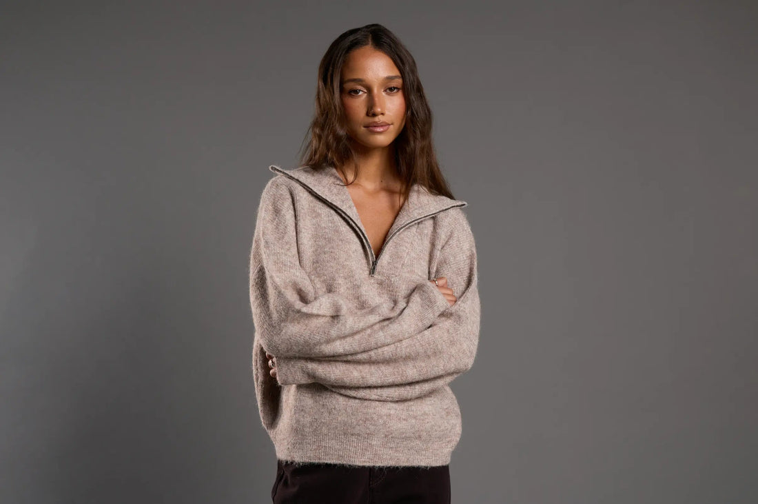 Model wearing a neutral knit for an effortless winter everyday outfit