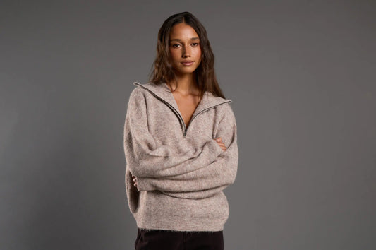 Model wearing a neutral knit for an effortless winter everyday outfit