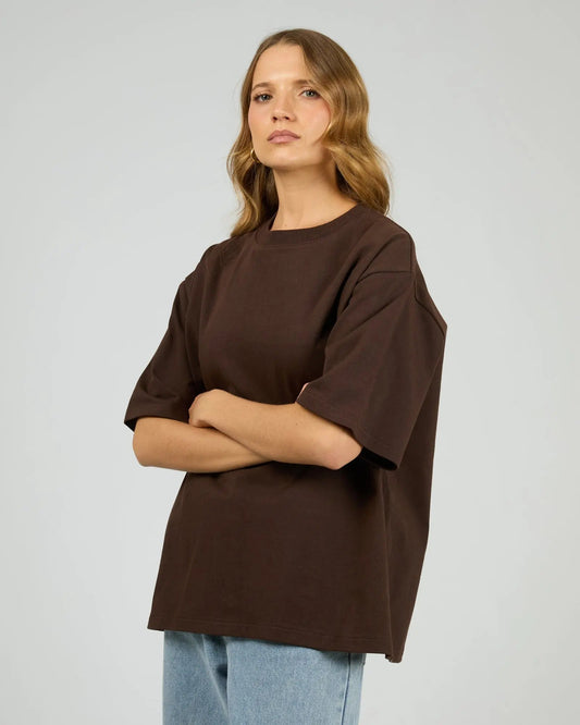 Woman wearing an oversized tee in chocolate — easy everyday outfit inspiration from The Rose Edit NZ