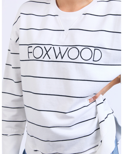 White sweatshirt with black stripes and 'FOXWOOD' text on a white background