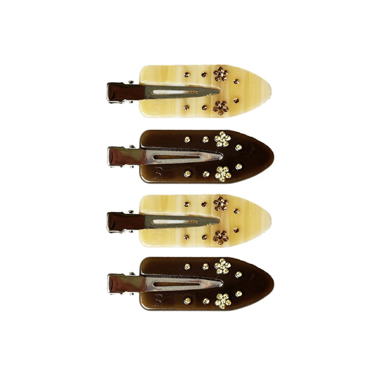 Set of four decorative hair clips with flowers on a white background. Buttermilk Maddie Creaseless Clips Shortbread Honey Dark Roast - The Rose Edit