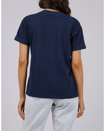 Person wearing a navy blue t-shirt on a plain background
