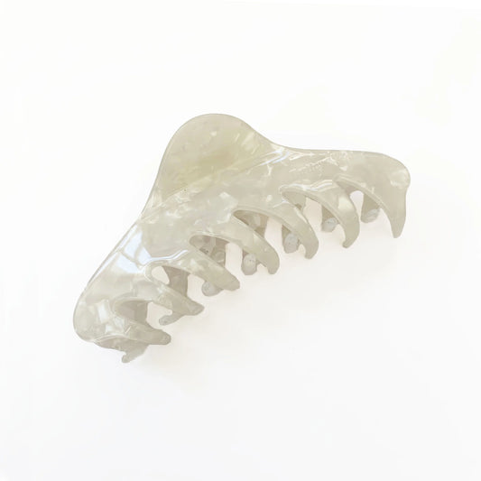 White hair clip on a white background. Buttermilk Georgia Claw Clip Classic Pearl - The Rose Edit
