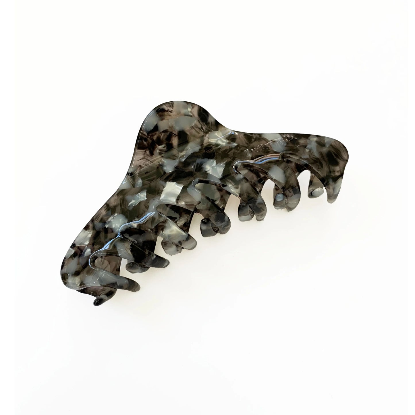 Marble-patterned hair clip on a white background. Buttermilk Georgia Claw Clip Snow Leopard - The Rose Edit