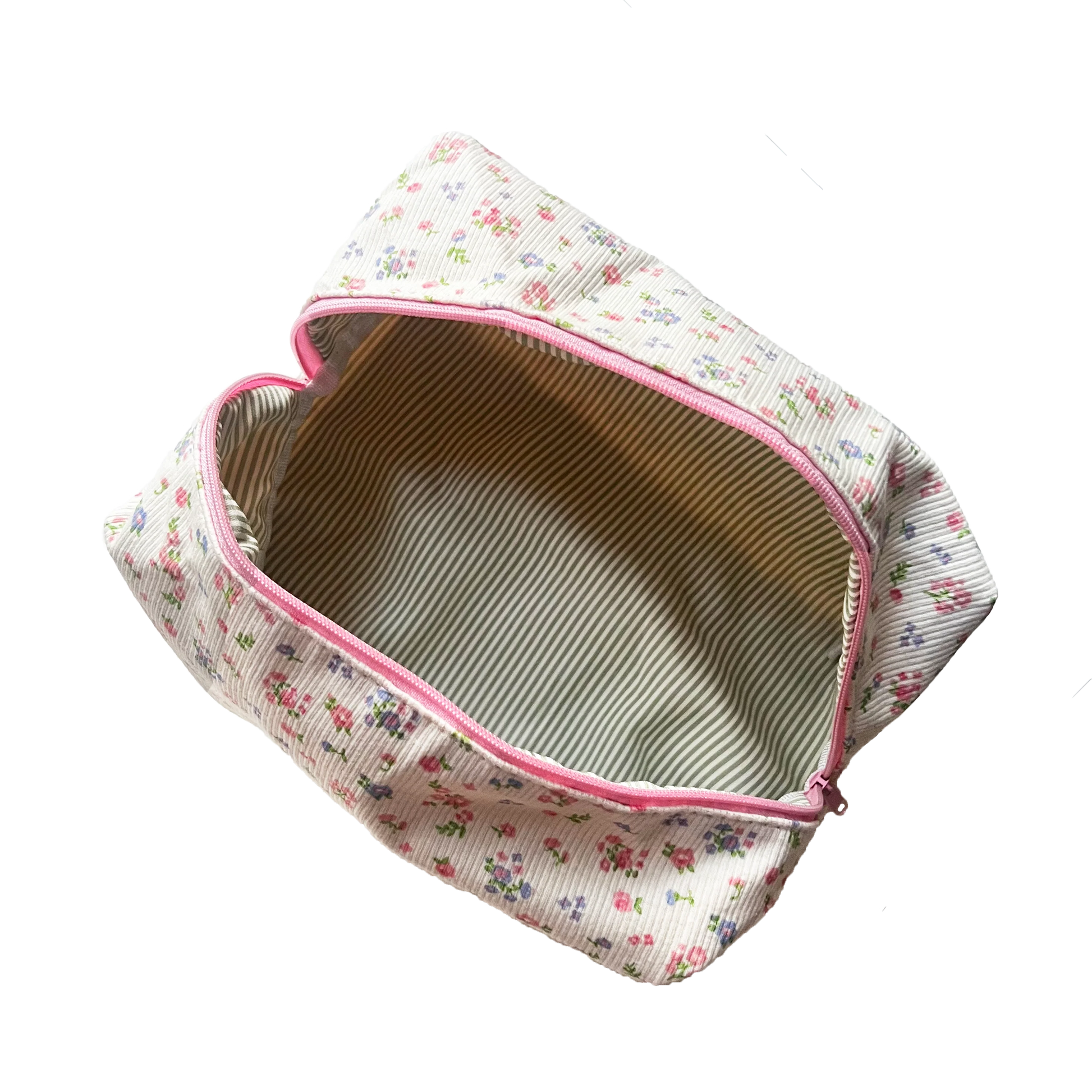 Floral-patterned pouch with pink zipper on a white background. Buttermilk Grace Carry All Bag Forget-Me-Not - The Rose Edit