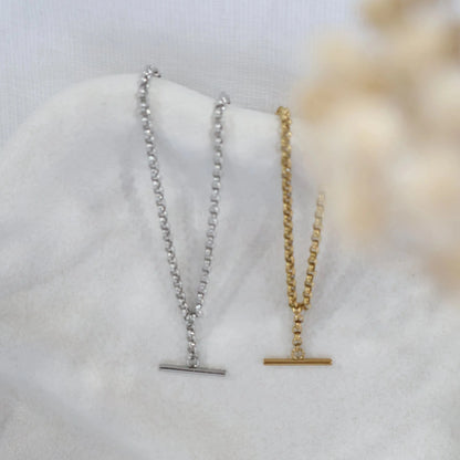 Two chain necklaces, one silver and one gold, on a white surface. Large T Bar Necklace KatyB Jewellery