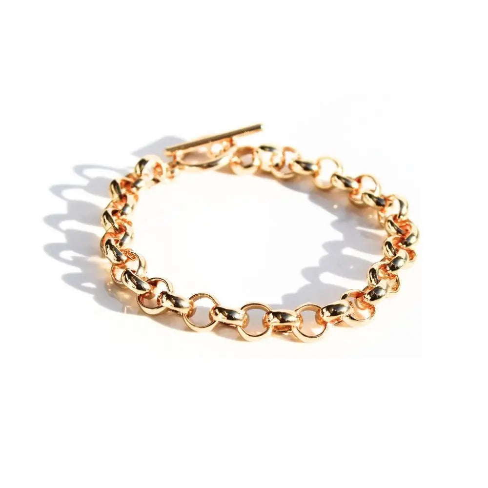Gold chain bracelet on a white background