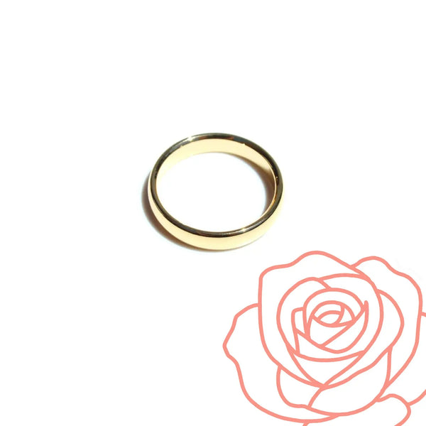 Gold ring on a white background with a red outline of a rose.