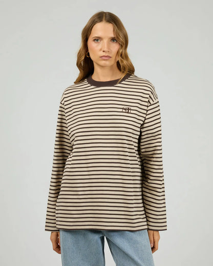Woman wearing a striped long-sleeve shirt against a plain background. Silent Theory Foundation Stripe Long Sleeve Tee Chocolate - The Rose Edit