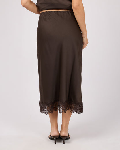 Brown skirt with lace hem on a white background. Hava Lace Skirt Coffee - The Rose Edit