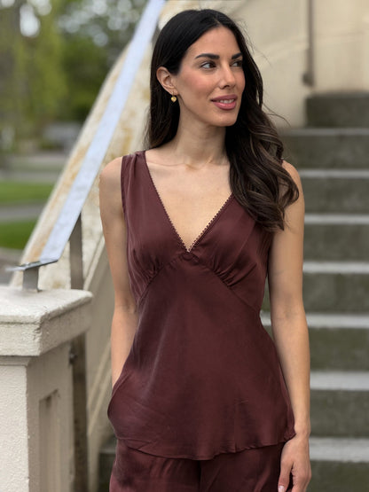 Mona Top in Chocolate with a gold coin necklace, styled outdoors