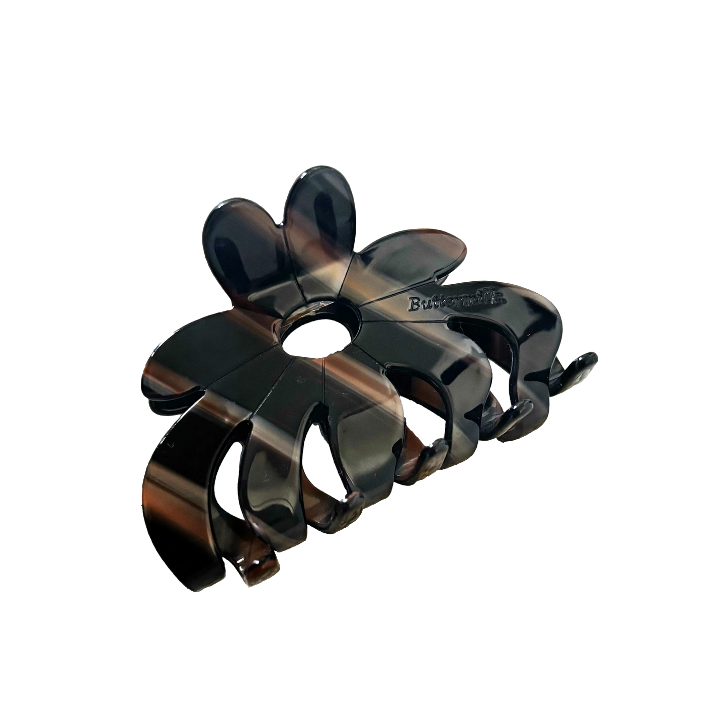 Black hair clip on a white background.Buttermilk Rebekah Claw Clip Coffee Table - The Rose Edit