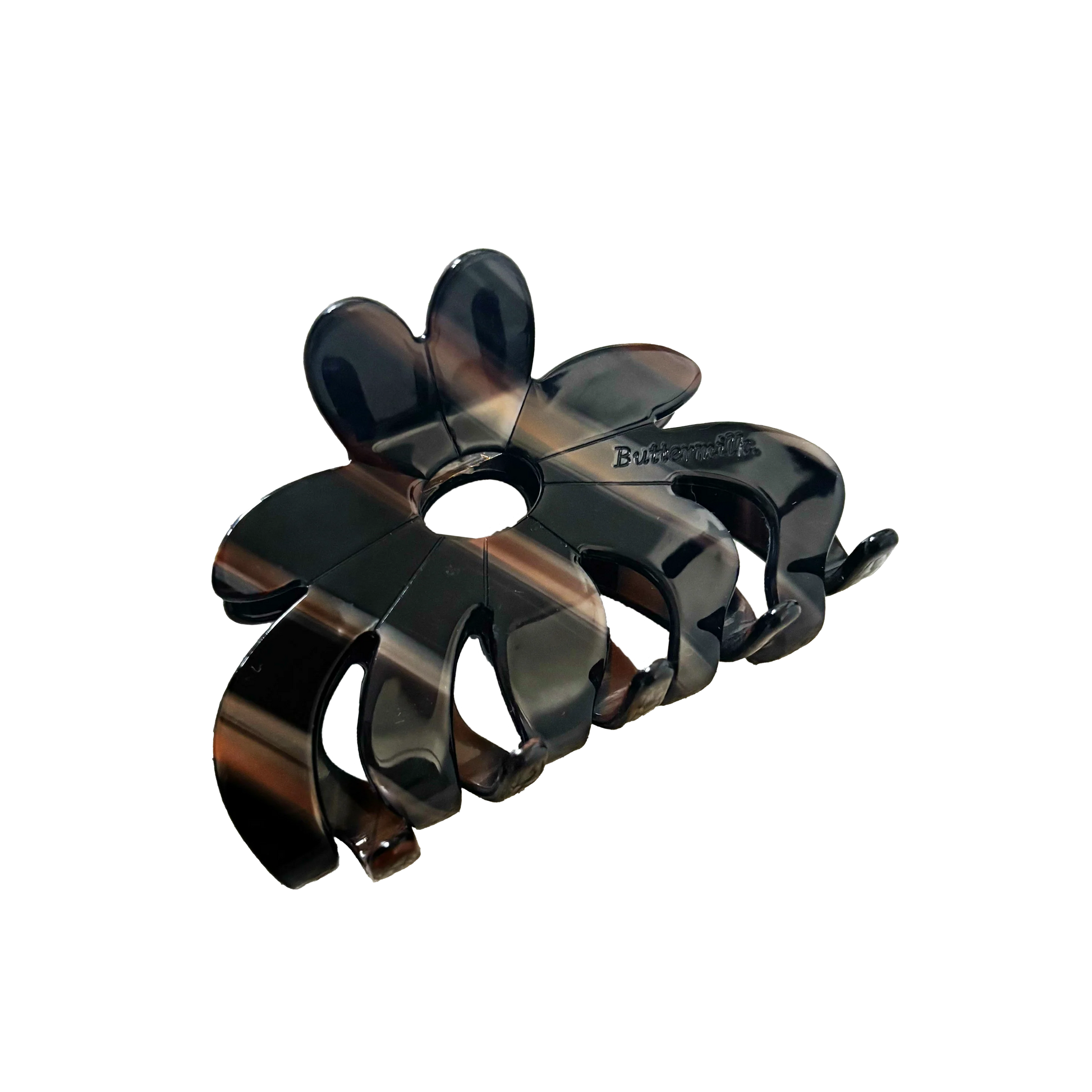 Black hair clip on a white background.Buttermilk Rebekah Claw Clip Coffee Table - The Rose Edit