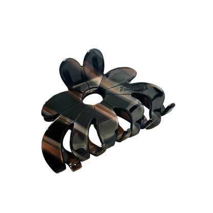 Black hair clip on a white background.Buttermilk Rebekah Claw Clip Coffee Table - The Rose Edit